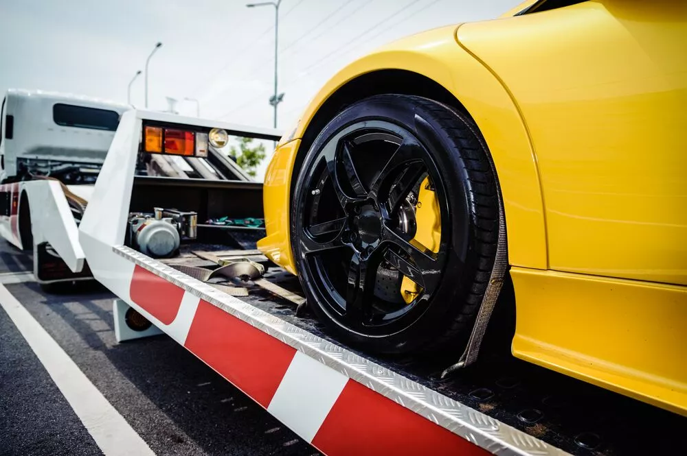 Tips when shipping the car through flatbed truck (recovery) and choosing a car shipping company